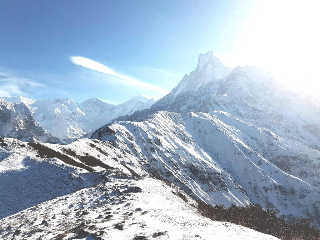 Snow-Capped Mardi himal under blue sky